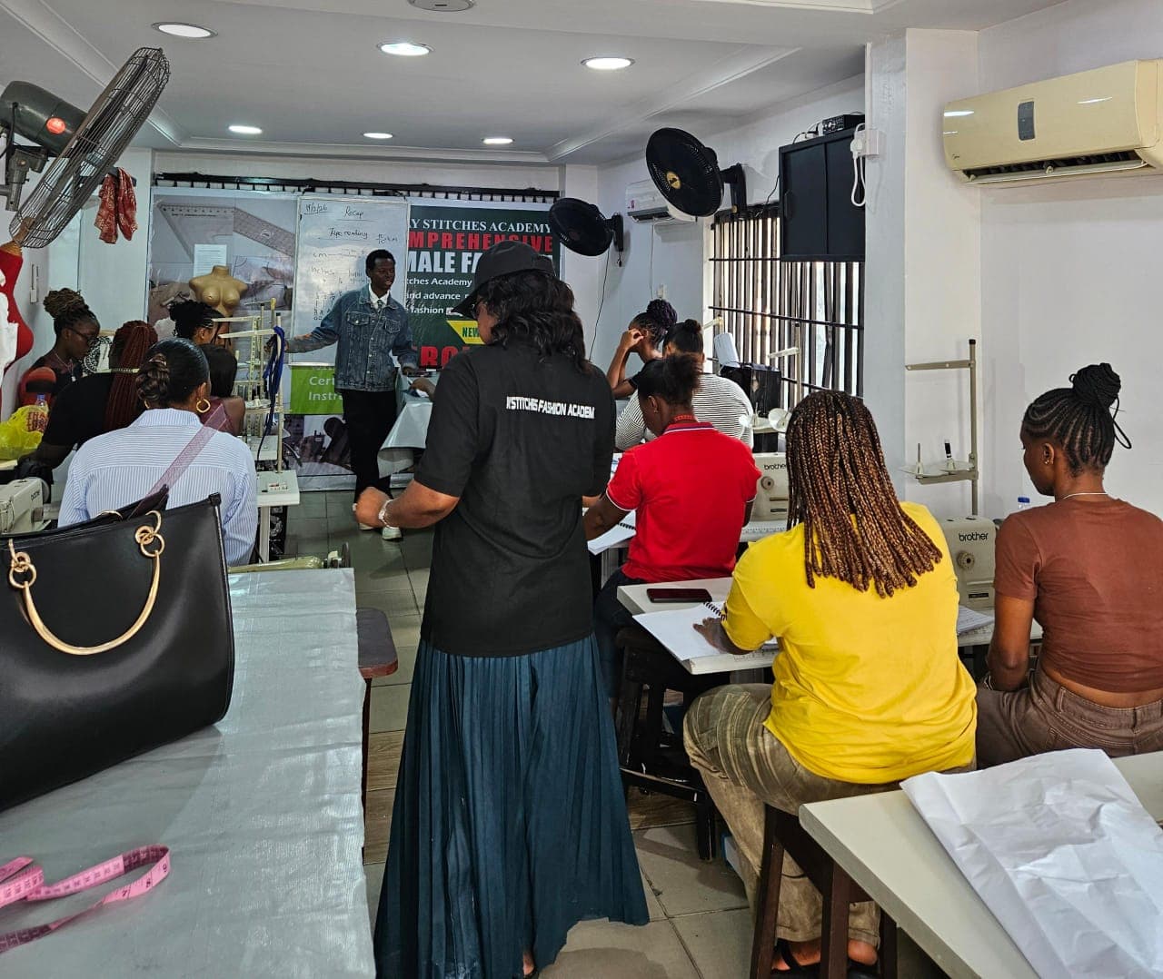 Instructor presenting a lesson to seated students